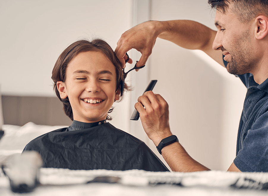 kid getting haircut at home